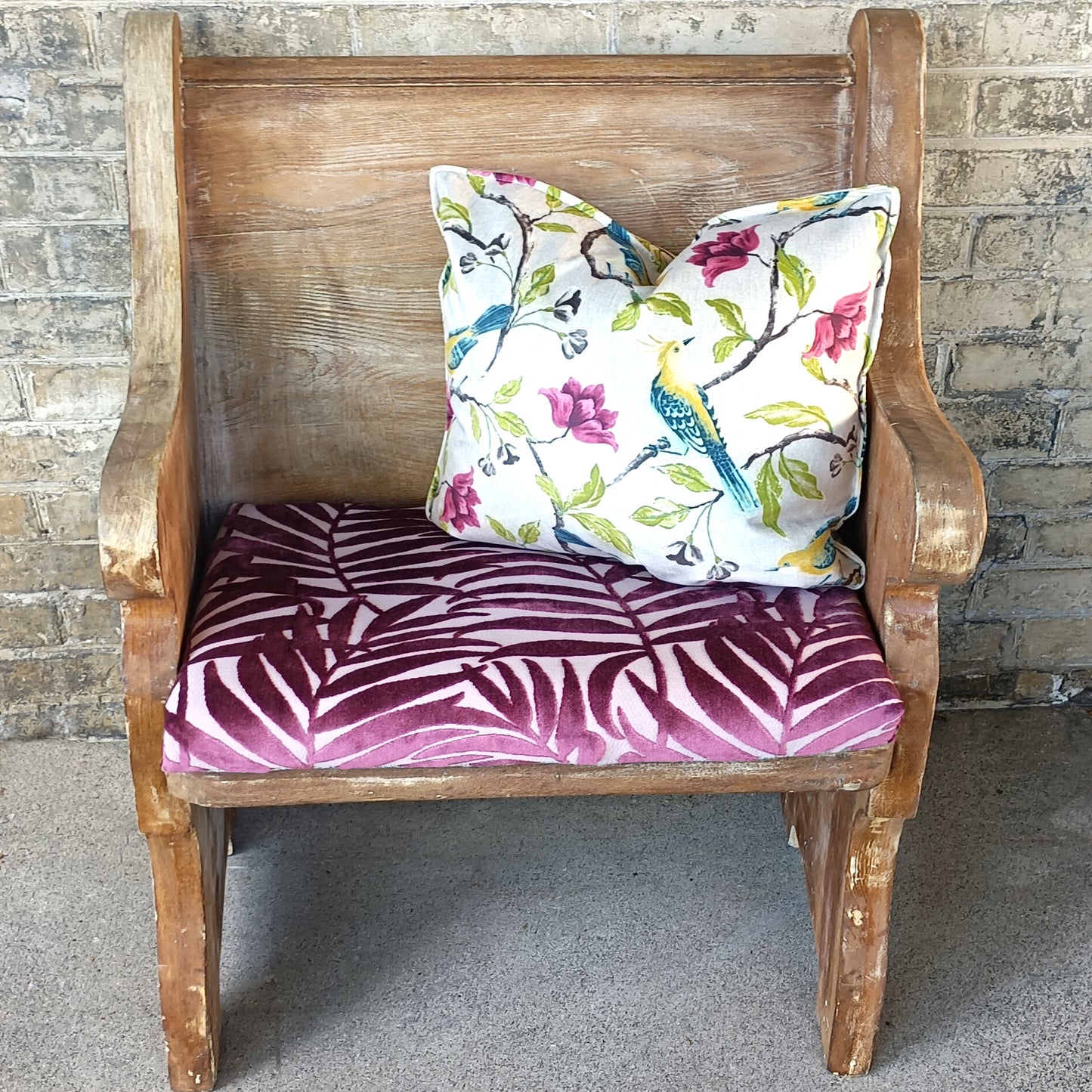 Vintage style cut velvet in magenta on bench