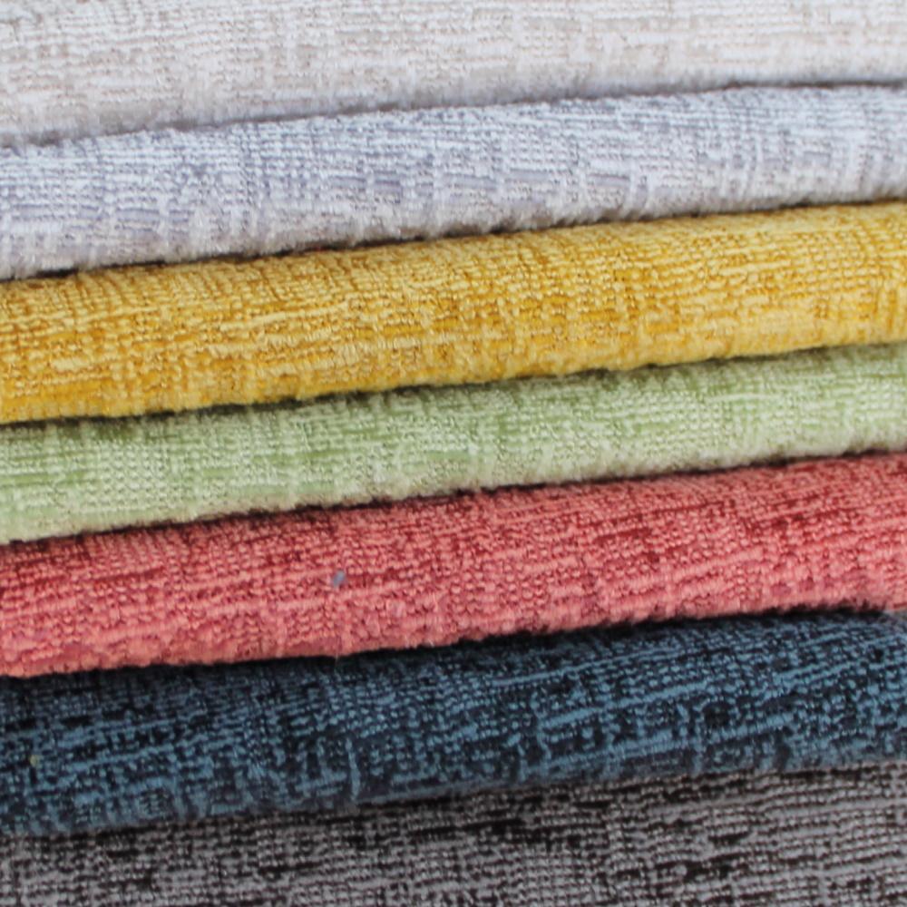 Stack of fabrics in different colors.