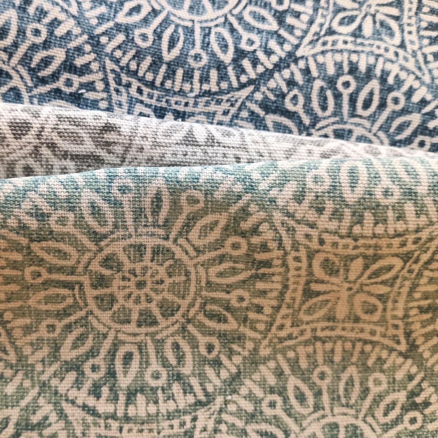 close up of mandala in 3 colors.