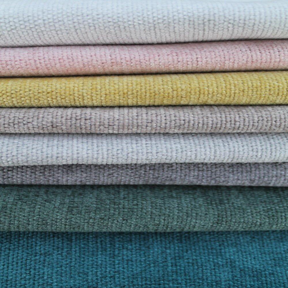 Stack of snug chenille fabrics.