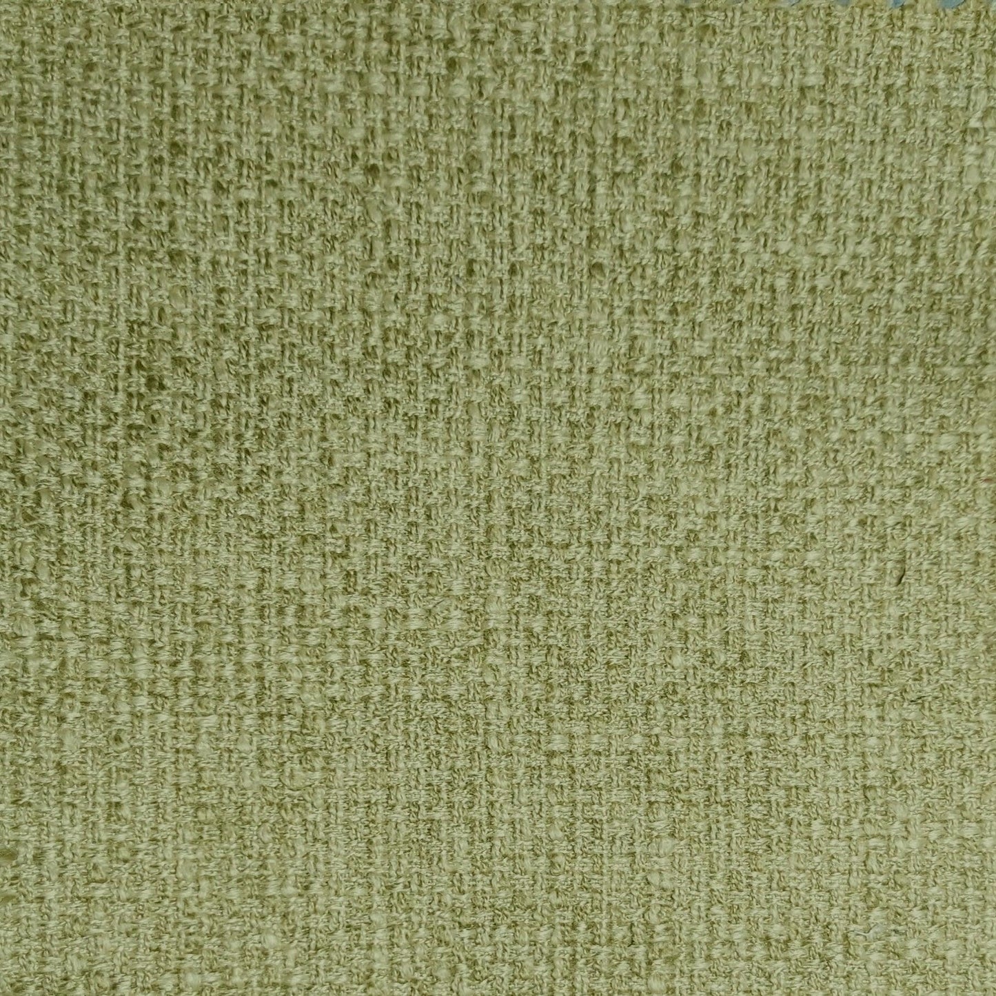 Tweed upholstery fabric in chartreuse.