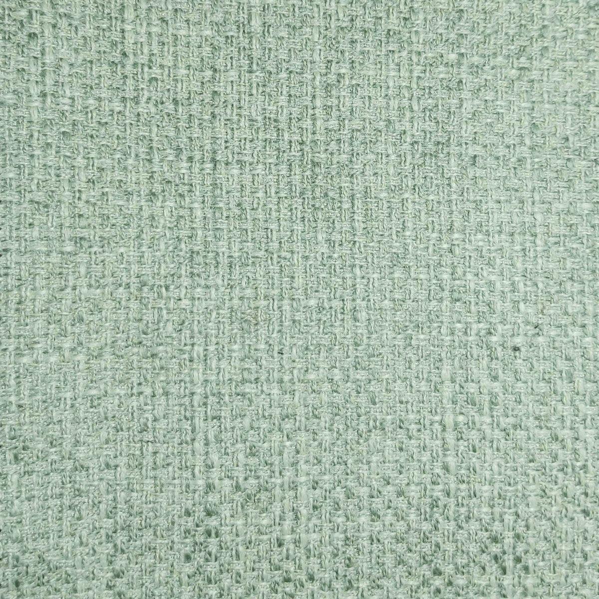 Remnant of pale green cloth - material store sample.