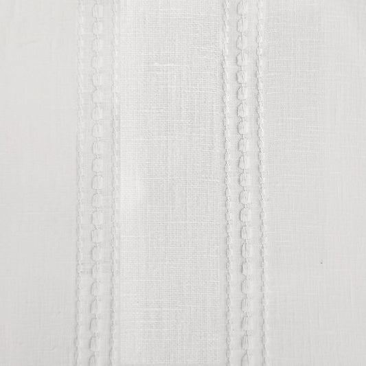 Online curtain fabric in ivory with embroidery.