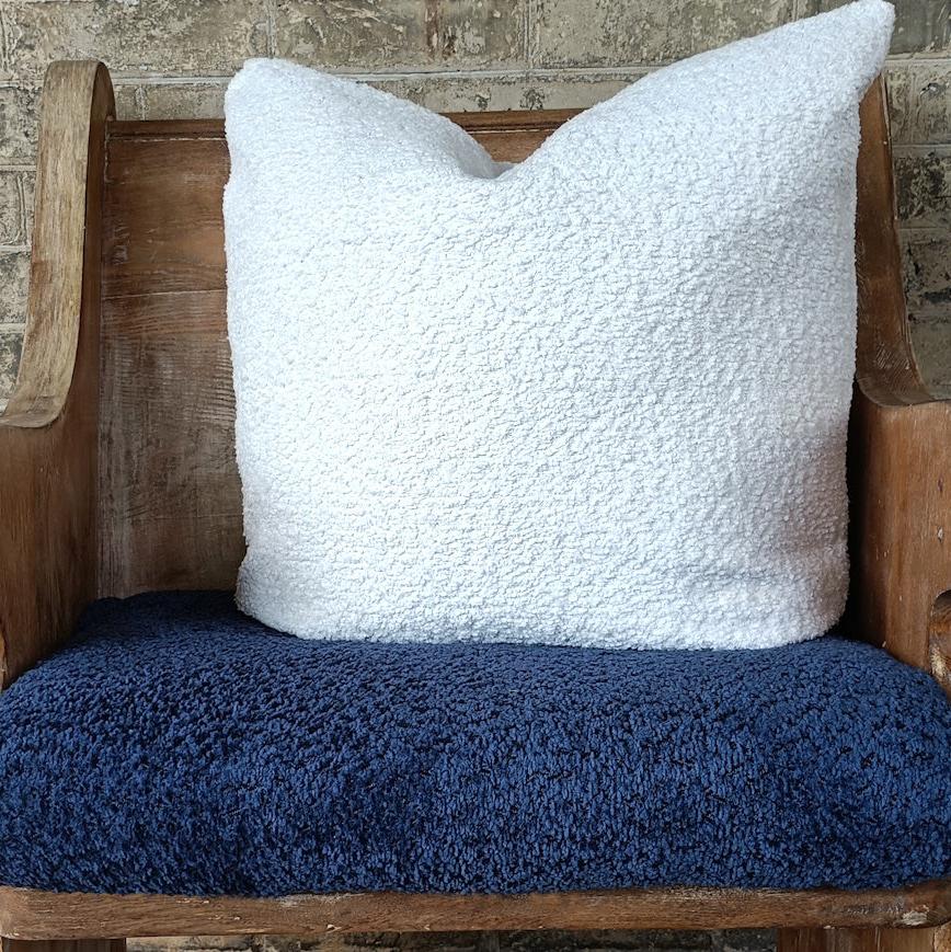 Boucle fabric on bench in navy and creme