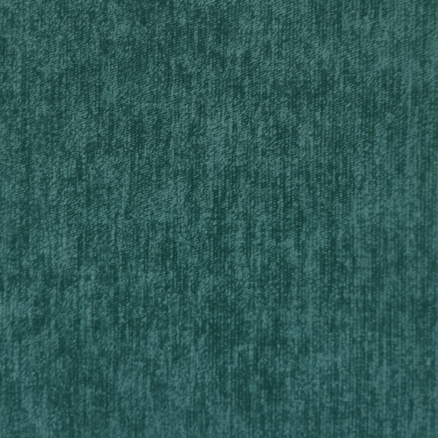 Couch fabric in emerald green.