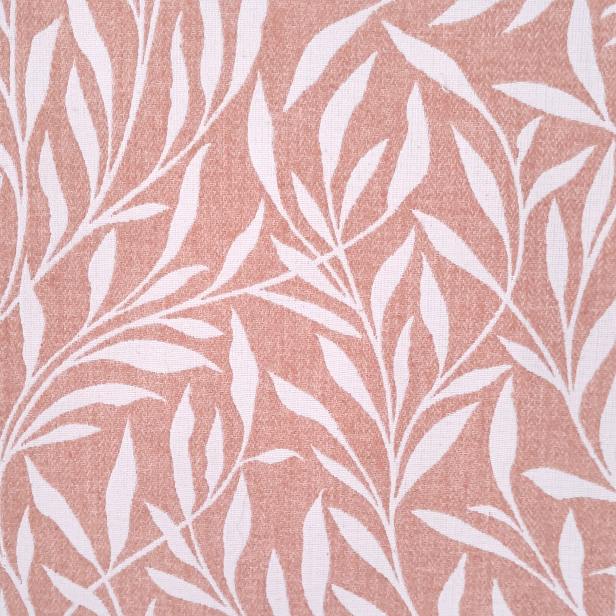 Sample of leaf design drapery fabric in coral