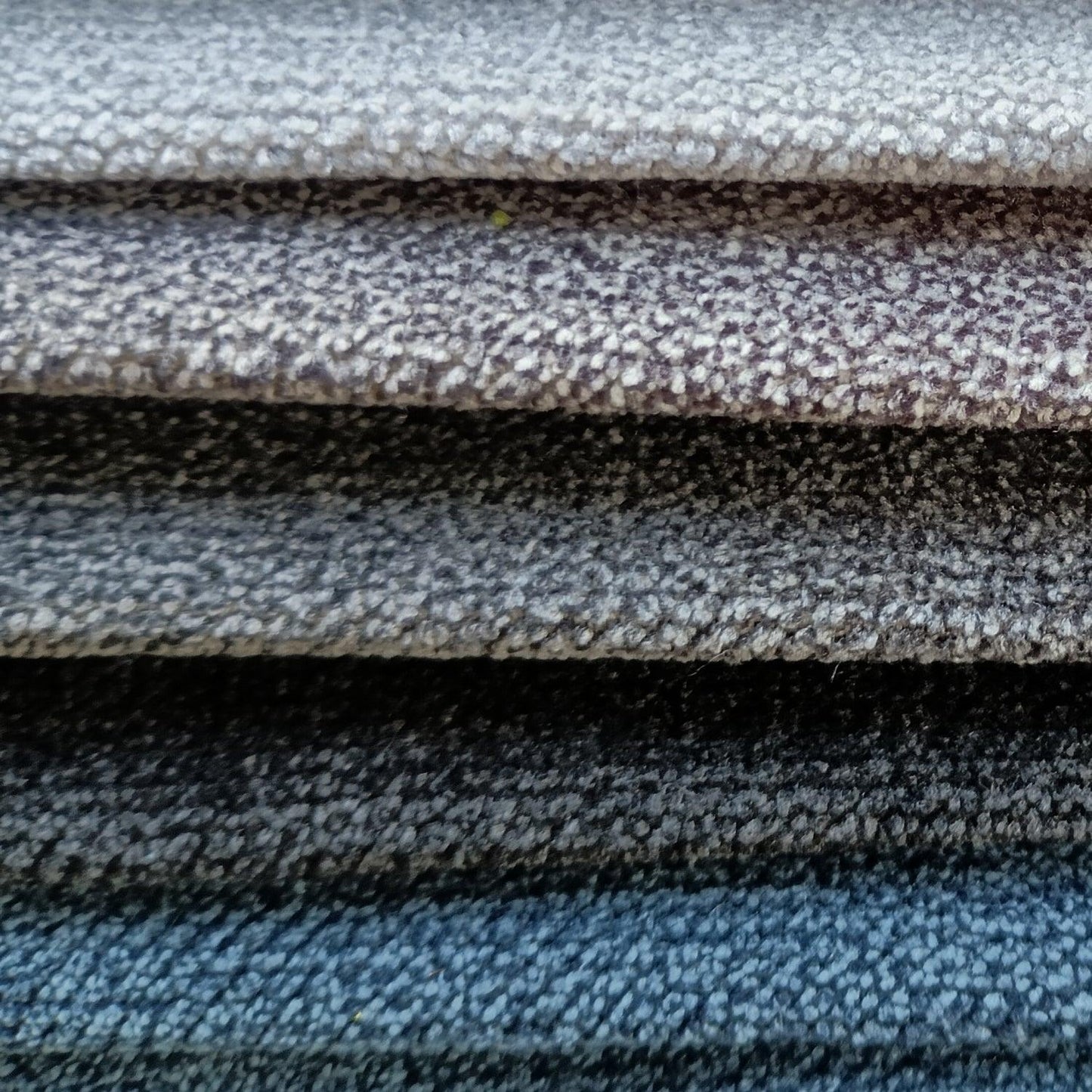 Stack of lulu fabric samples in different colors