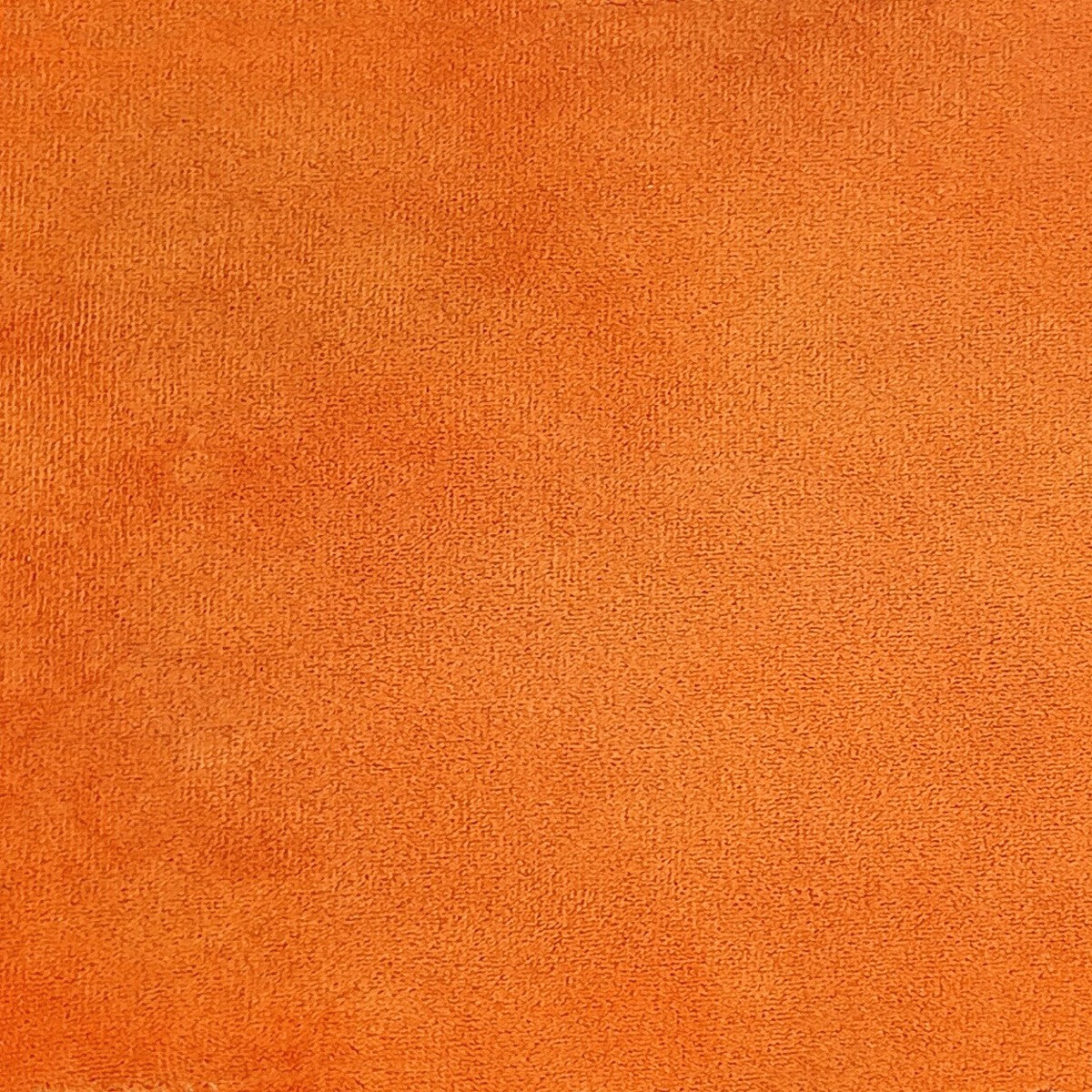 Orange velvet upholstery fabric.