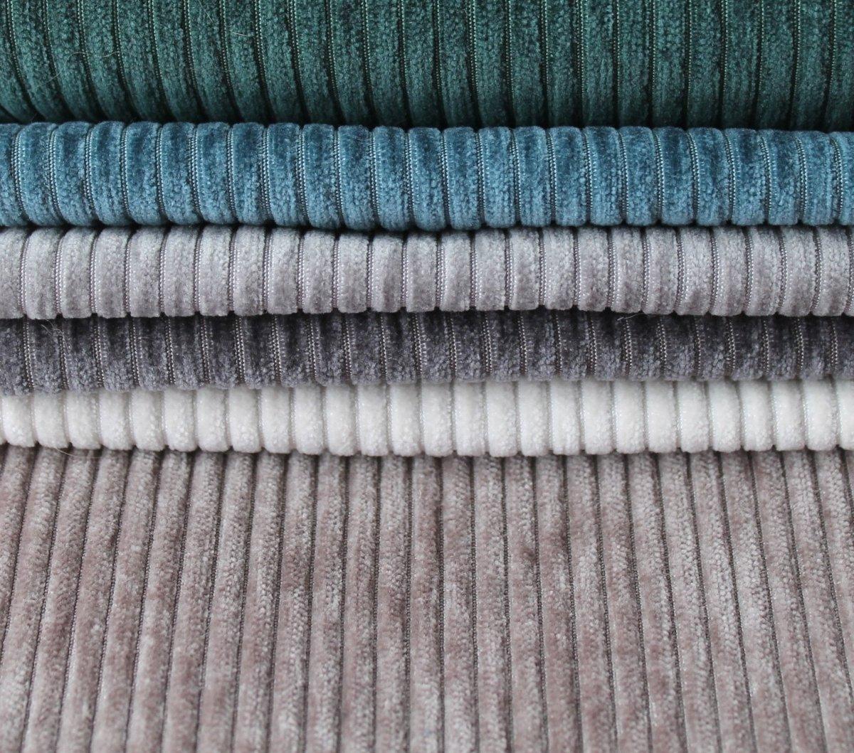 Stack of roscoe corduroy fabrics.