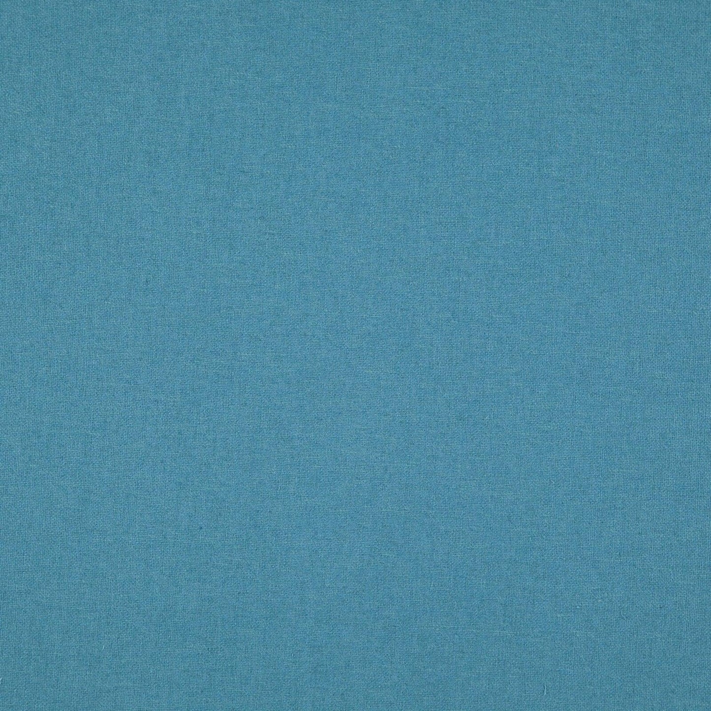 Linen upholstery fabric in turquoise color.