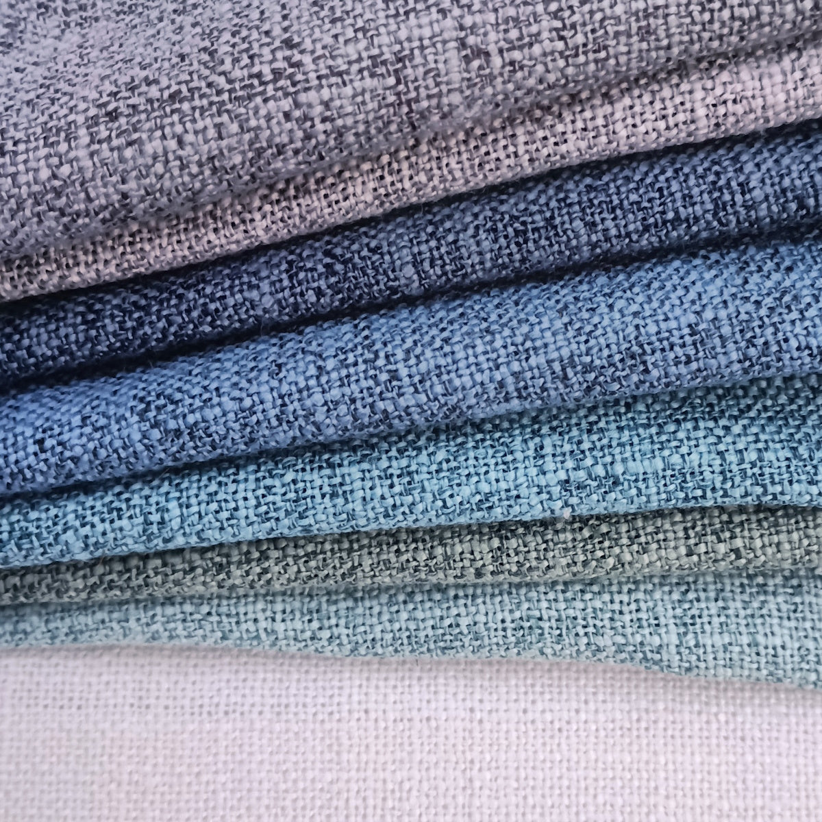 Home décor fabrics in blues ad grey