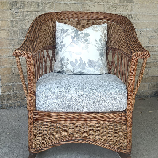 Toss cushion with grey cotton floral upholstery