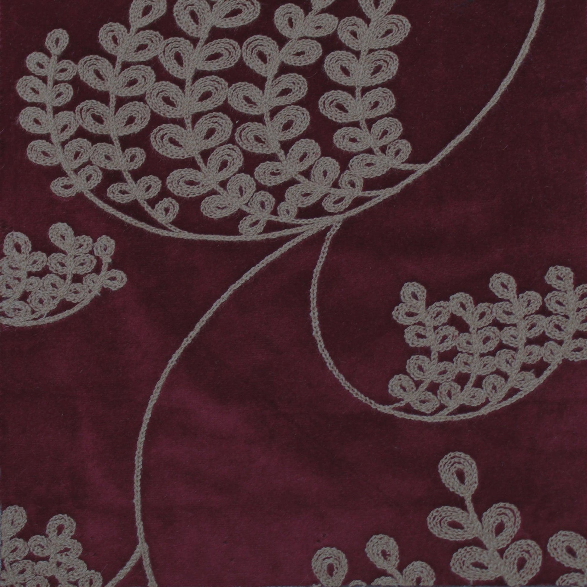 Close up of Calgary upholstery fabric in Wine 